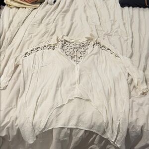 Millau oversize white button down with metal links on sleeves and back